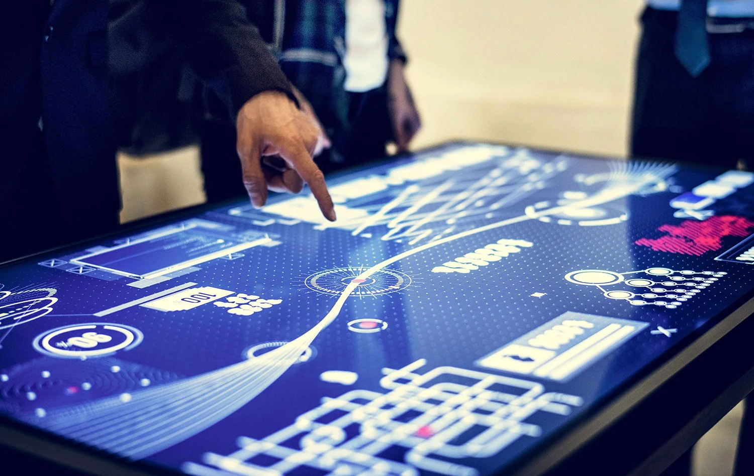 Instructor using an interactive touch display during a training session